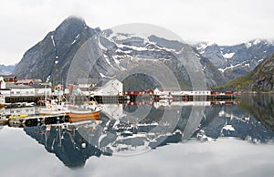 Norwegian fjord with reflection in water