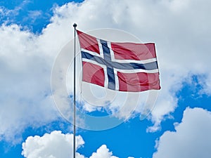 Norwegian flag waving sky
