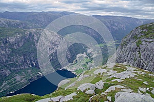 Norwegian landscape with deep fjord and mountains