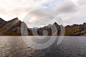 Norwegian landscape with Nordfjord fjord, mountains, forest and glacier in Reine, Norway - the photo was taken from a boat