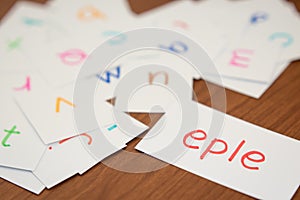 Norwegian; Learning the New Word with the Alphabet Cards; Writing APPLE