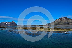 Norwegian mountains seen from the sea. Above the Arctic Circle.