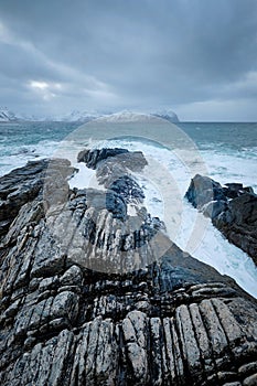 Norwegian Sea waves on rocky coast of Lofoten islands, Norway