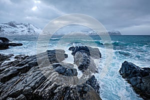 Norwegian Sea waves on rocky coast of Lofoten islands, Norway