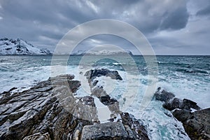 Norwegian Sea waves on rocky coast of Lofoten islands, Norway