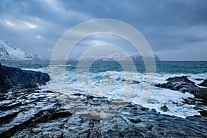 Norwegian Sea waves on rocky coast of Lofoten islands, Norway