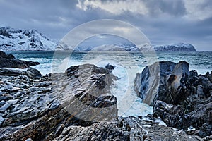 Norwegian Sea waves on rocky coast of Lofoten islands, Norway