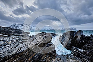 Norwegian Sea waves on rocky coast of Lofoten islands, Norway