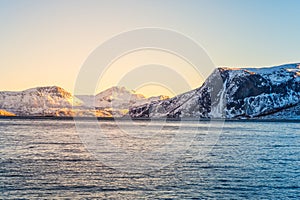 Norwegian Snow Mountains with Fjord close to Tromso