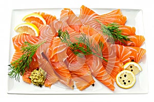 Norwegian-style gravlax platter, with thinly sliced cured salmon, served with mustard sauce, dill, and rye bread