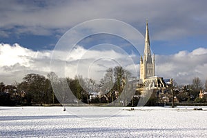 Norwich Cathedral and cricket field in the snow