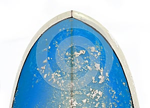 Nose of a bright blue surfboard