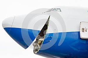 Nose of cargo compartment in the plane standing at the airport.