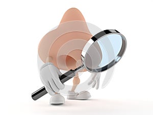 Nose character looking through magnifying glass