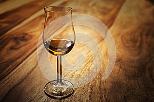 Nosing glass with scotch single malt whisky photo