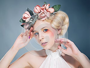 Nostalgia. Portrait of Romantic Blonde with Wreath of Flowers. Expression