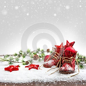 Nostalgic christmas decoration with antique baby shoe photo