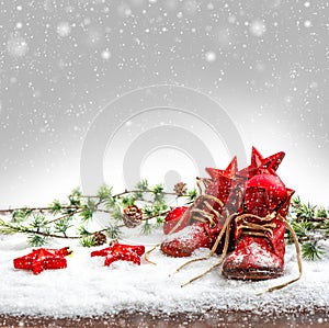 Nostalgic christmas decoration with antique baby shoes photo