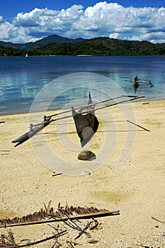 nosy be boat palm rock stone branch lagoon and coastline