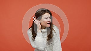 Nosy curious woman listening to private conversation, spying, attentively hearing whisper