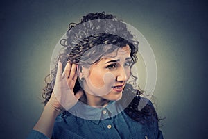 Nosy woman hand to ear gesture carefully secretly listen in on juicy gossip