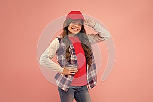 Not stereotypes. Little hipster wear cap pink background. Hipster look of small girl. Happy child in hipster style