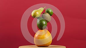 not a successful take, rotating fresh fruits on a red background fall