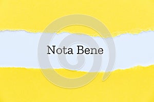Nota bene printed on paper background for presentation slide photo