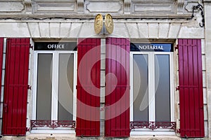 Notaire french sign gold on building wall notary office building photo