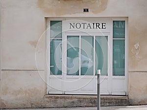 Notaire french text sign means office notary in facade building agency photo