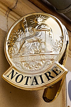 Notaire golden french sign gold logo notary office building photo