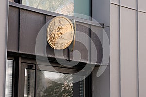 Notaire sign gold on wall entrance to french notary office photo