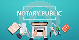 notary hands working on laptop signing and legalization documents lawyer office workplace desk top angle view
