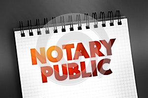 Notary public - public officer constituted by law to serve the public in non-contentious matters, text on notepad, concept