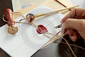 Notary public wax stamper on old wooden background