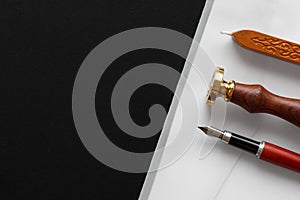 Notary public wax stamper. White envelope with brown wax seal, golden stamp. Responsive design mockup, flat lay. Still life with