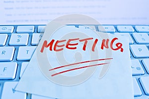 Note on computer keyboard: meeting