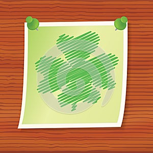 Note with four-leaf shamrock