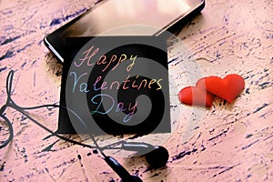 Note  Happy Valentines Day , card for Valentines Day on table, Art scratch paper for message. Retro toned