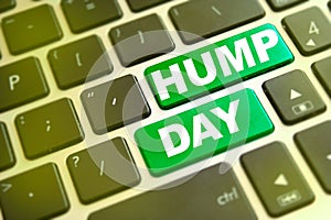 Note HUMP DAY writting on green button on computer keyboard concept