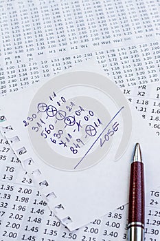 A note with the lose selection of the winning codes on bookmakers