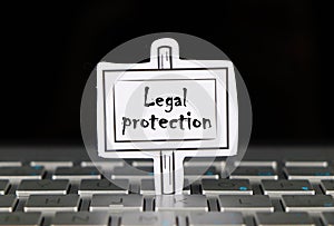 Note on monitor with text Legal Protection.