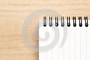 Note pad with white pages with printed lines