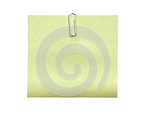 Note with a paper clip. Isolated on a white background (clipping path)