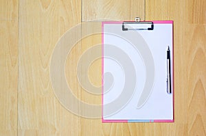 Note paper Coffee mug Pen top view on a wooden floor writing idea on book, work space