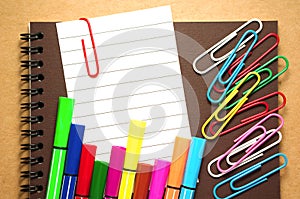 Note paper with colorful marker and clips