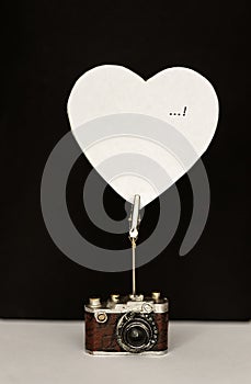 Note paper hung on heart shaped note holder