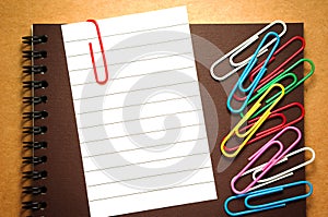 Note paper with paperclips