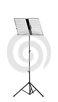 Note stand with music sheets on white