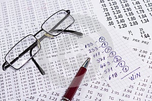 A note with the win selection of the winning codes on bookmakers